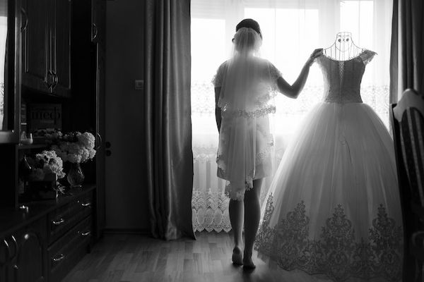 bride- wedding gown - bride getting dressed - going to the bathroom in your wedding gown