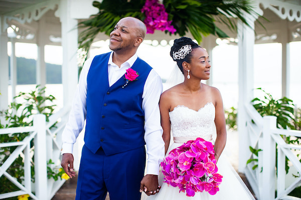 North Carolina destination wedding planner- Jamaican destination wedding - groom in royal blue suite 0 bride with hot pink tropical bouquet - hot pink bridal bouquet - bride and groom 