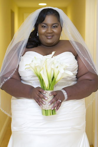 curvy bride - curvy black bride - bride carrying calla lily bouquet with crystal band - bride- bride with wedding bouquet - North Carolina wedding 